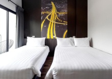 Трёхместный номер Standard с балконом в Sleep Mai Airport Lifestyle Hotel