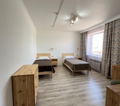 Номер стандарт с 2 односпальными кроватями в Домино