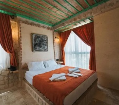 Двухместный люкс двуспальная кровать в La Casa Cave