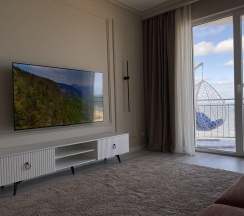 2-комнатные апартаменты люкс премиум с 1 двуспальной кроватью и диваном в Apart Ru Hotel