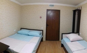 Четырёхместный номер Comfort с красивым видом из окна в Гостевой дом
