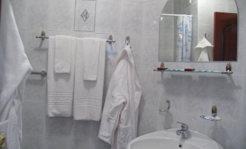 Номер стандарт с 2 односпальными кроватями в O`camp