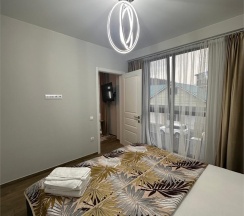 Апартаменты двухкомнатные (ЛЮКС) с балконом и красивым видом в Polikariya