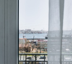 Стандарт с балконом в PORT MAY. HOTEL&RESTAURANT