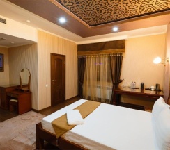 Двухместный люкс двуспальная кровать в Salut Hotel Almaty