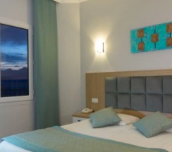 Угловой люкс с балконом в Antalya Adonis Hotel