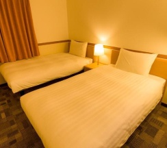 Двухместный номер Standard 2 отдельные кровати в Toyoko Inn Okinawa Naha Omoromachi Ekimae