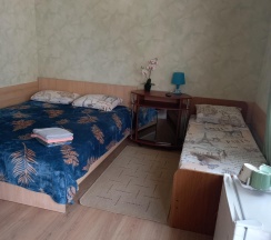 Комната стандарт с 1 односпальной и 1 двуспальной кроватью в Ванилька