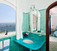 Двухместный номер Superior с видом на море двуспальная кровать в Hotel Pupetto