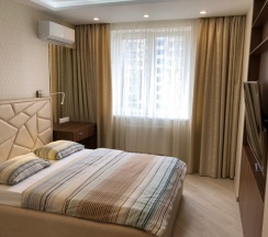 Апартаменты с гостиной и спальней с двуспальной кроватью в Sibgat Apartments