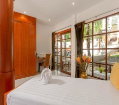 Двухместное бунгало Deluxe с видом на сад двуспальная кровать в Club Bamboo Boutique Patong Beach Resort