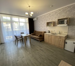 Пятиместные апартаменты с 2 комнатами с балконом и с видом на город в Amare