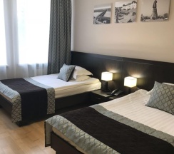 Номер стандарт улучшенный с 2 односпальными кроватями в Хабаровск