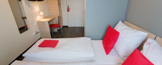 Двухместный номер Standard 2 отдельные кровати в MEININGER Hotel München City Center