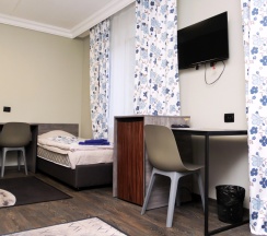 Кровать в общем номере в Тахар