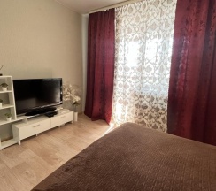 1-комнатные апартаменты студия с двуспальной кроватью в Апартаменты NHome