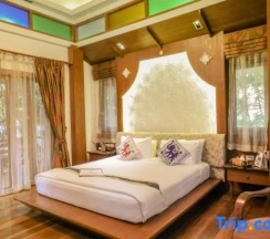 Двухместная вилла двуспальная кровать в Vartika Resovilla KuiBuri Beach Resort and Villas