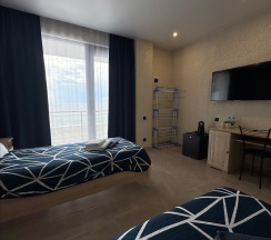 Стандарт с видом на море и общим балконом (twin) в Costa d`Ora