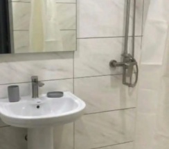 Четырёхместные апартаменты Deluxe с балконом и с красивым видом из окна в Гостевой дом Белый Лотос