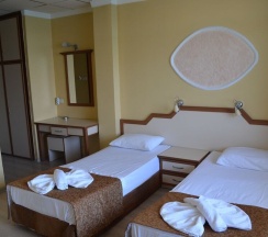 Двухместный номер Standard с балконом 2 отдельные кровати в Ayvalik Palas Hotel