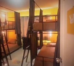 Кровать в общем номере в CM City Hostel