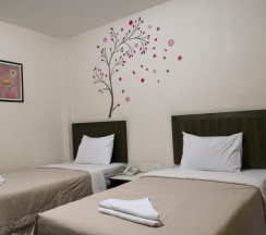 Двухместный номер Standard 2 отдельные кровати в Baan Suksiri Hotel
