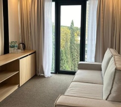 Двухместный номер Семейный с 2 комнатами с красивым видом из окна двуспальная кровать в Изумруд