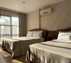 Четырёхместный Сьют c 1 комнатой с балконом и с видом на море в Aimara