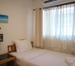Трёхместный номер Standard с балконом в Sunshine Guest House