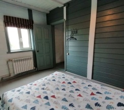 Двухместный коттедж с 4 комнатами с балконом двуспальная кровать в Уютный дом на Родине Деда Мороза