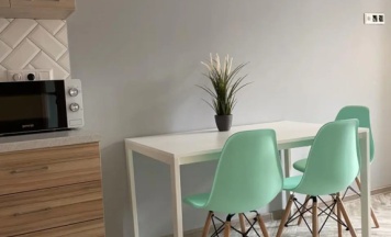 Четырёхместные апартаменты с балконом и с видом на город в Апартаменты Comfort 2:0
